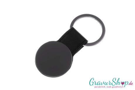 Dunkel eloxierter Schlüsselanhänger 47 mit Kunstleder, ca. 77 × 35 mm – individuell graviert, Gravur kostenlos